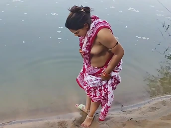 Desi Aunty enjoys a dewy outdoor shower with her busty Indian costs