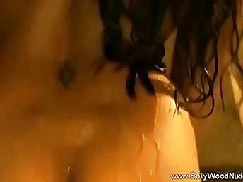 Indian stunner is dancing and leisurely taking off her clothes, knowing that someone is eyeing her