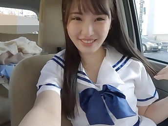 Steaming Chinese nubile on touching a nice face gives a driving palm-job & gets ape penetrated in the car